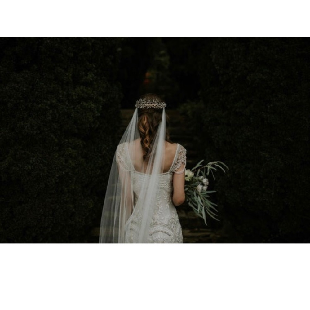 Floor length Ivory Veil. Never worn.